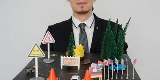 Image of Benjamin Sliwa with his doctor hat