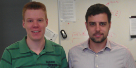 Portrait photo of a student with his supervisor