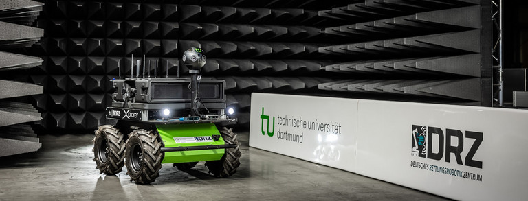 A robotic platform in front of walls