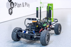 Small-scaled vehicle with camera and green marker