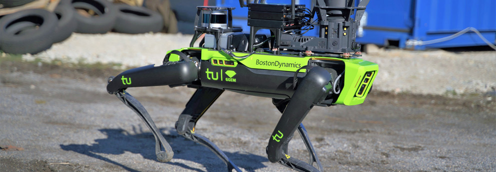 A boston dynamic Spot walking outdoor