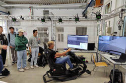 A student teleoperating a car