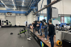 SPOT robot standing in front of people