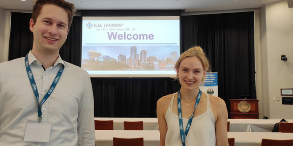 CNI researchers Simon Häger and Melina Geis at IEEE LANMAN 2024.
