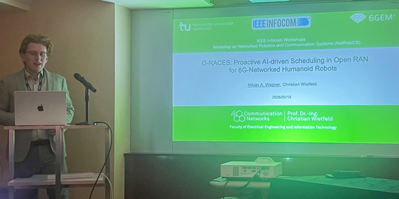 Niklas Wagner presenting O-RACES at the IEEE INFOCOM 2026 NetRobiCS Workshop.