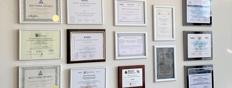 Awards hanging on a wall