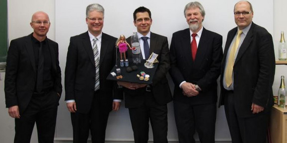 Björn Duzsa with his doctor hat